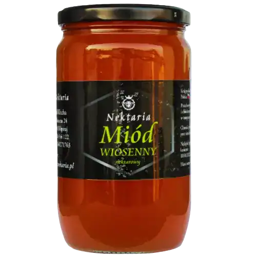 Naturalny miód pszczeli w słoiku z etykietą Nektaria.